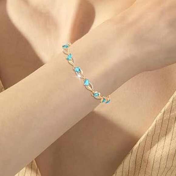 Neiman Marcus 18K Gold Plated Navy Blue Twist Trinity Eternity Tennis Bracelet - Picture 1 of 4